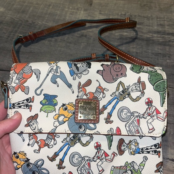 Disney Toy Story Dooney & Bourke Cream Crossbody Bag with Toy Story Characters - Picture 1 of 7